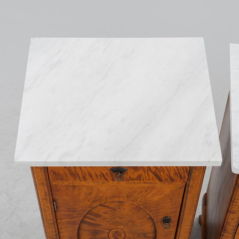 A pair of bedside tables, early 20th century.