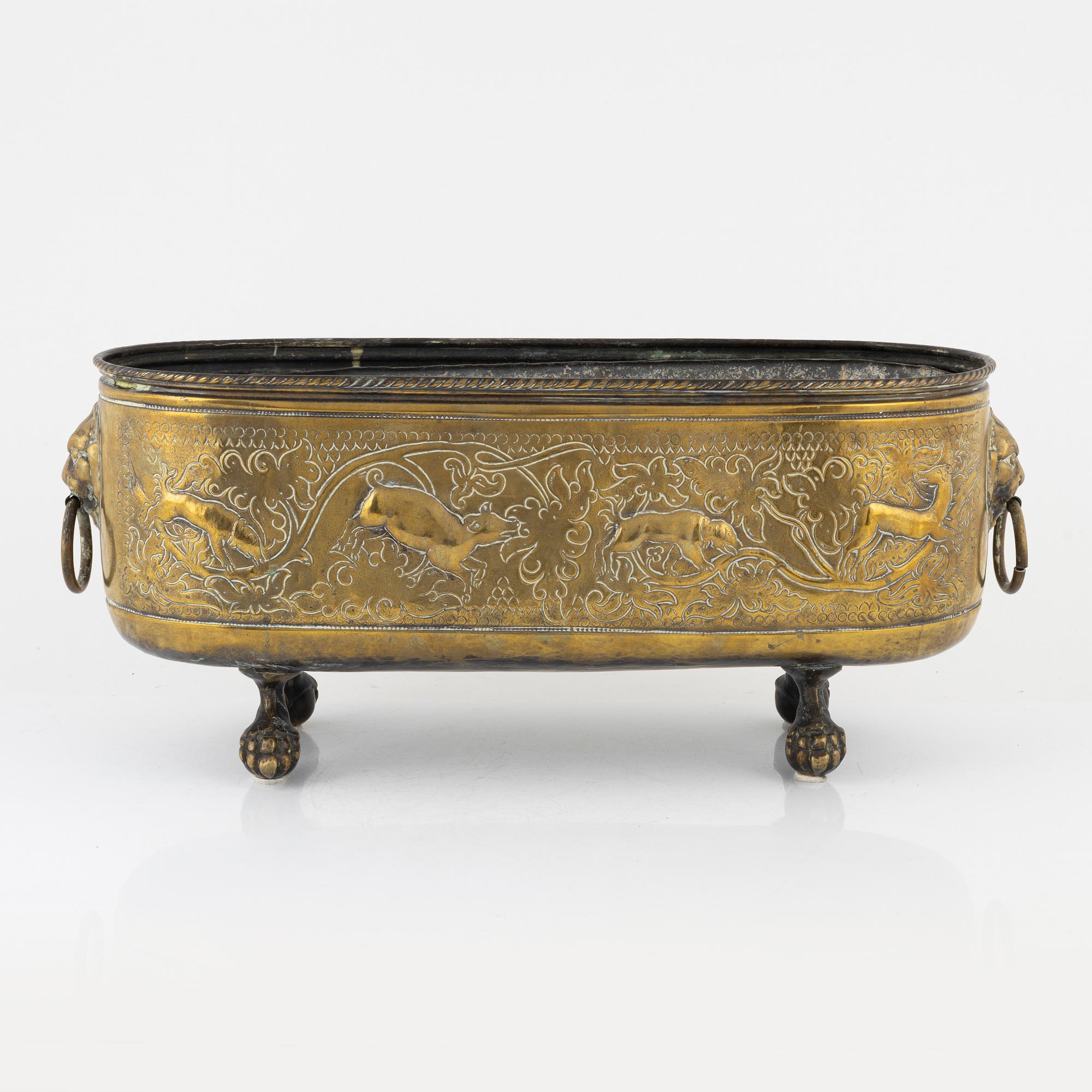 A 19th century brass jardinière.