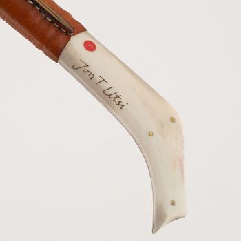 Jon Tomas Utsi, a reindeer horn knife, signed.