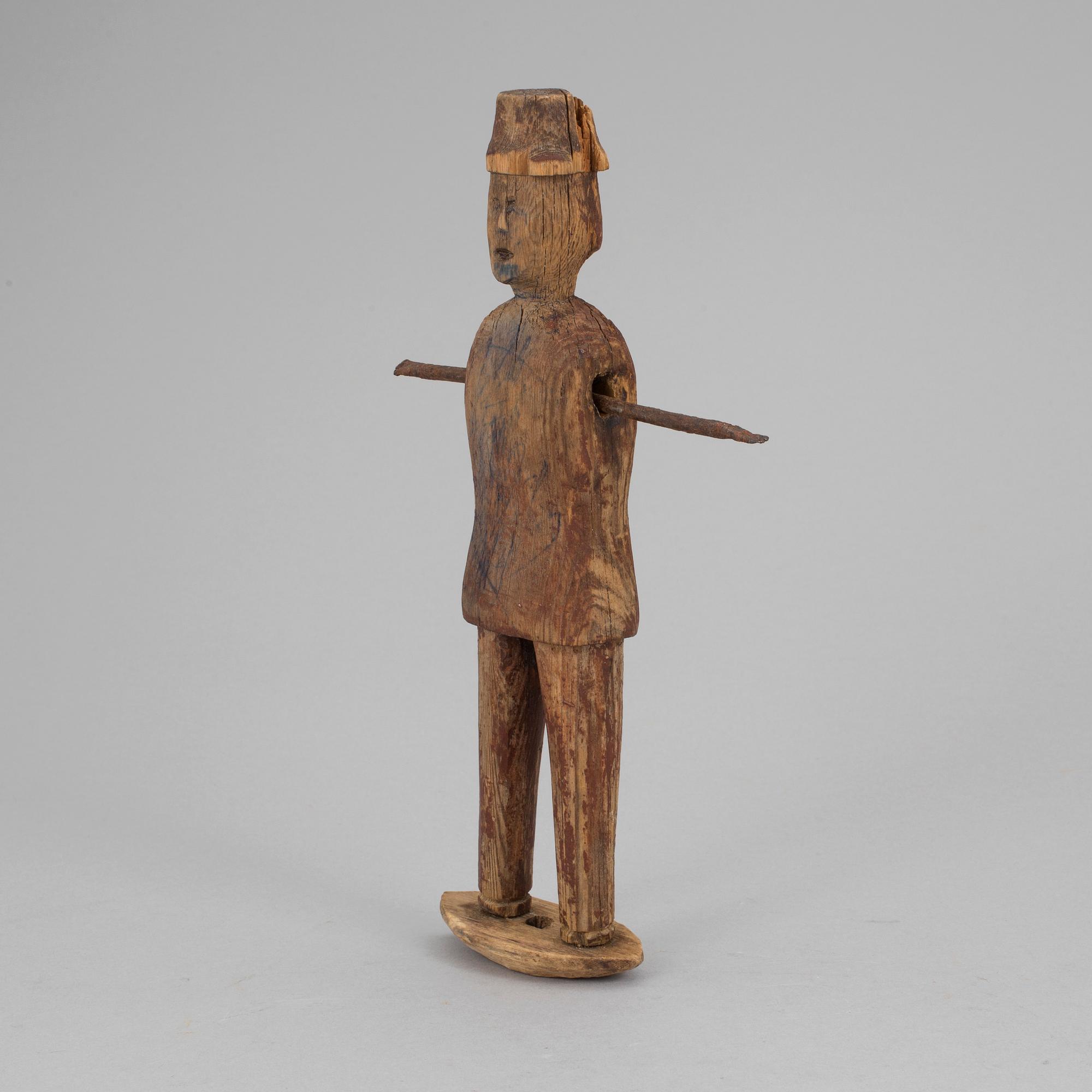 A wooden tool/sculpture, ca 1850.