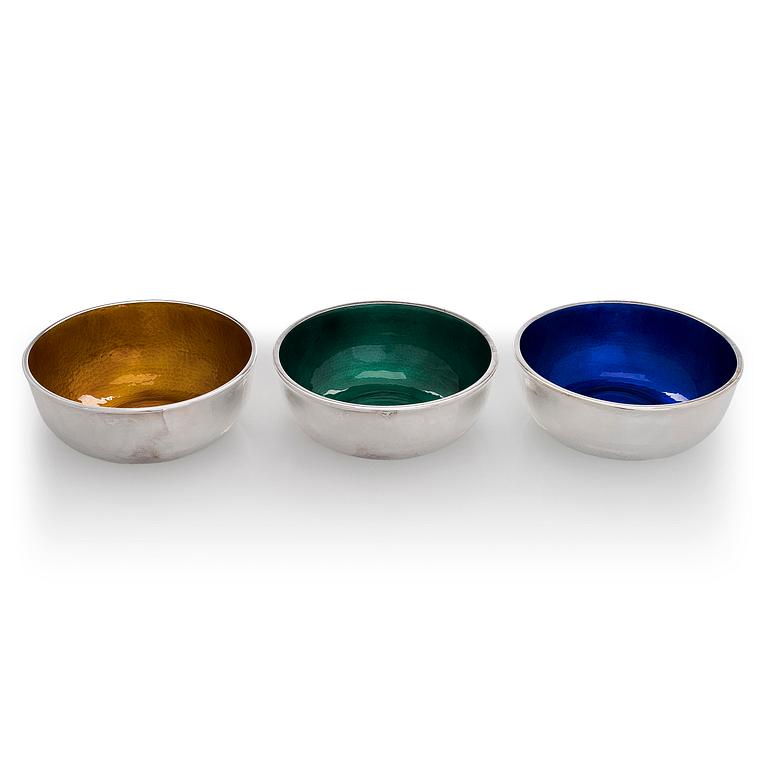 A set of three sterling silver and enamel bowls, maker's mark of A. Tillander, Turku 2005.