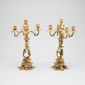 A pair of bronze candelabras. End of the 19th Century.