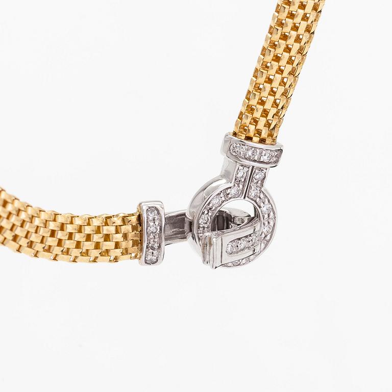 Halsband, 18K guld/vitguld, diamanter totalt ca 0.21 ct, Italien.