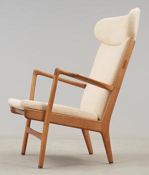 A Hans J Wegner "AP-15" oak armchair, AP-stolen, Denmark 1950-60's.