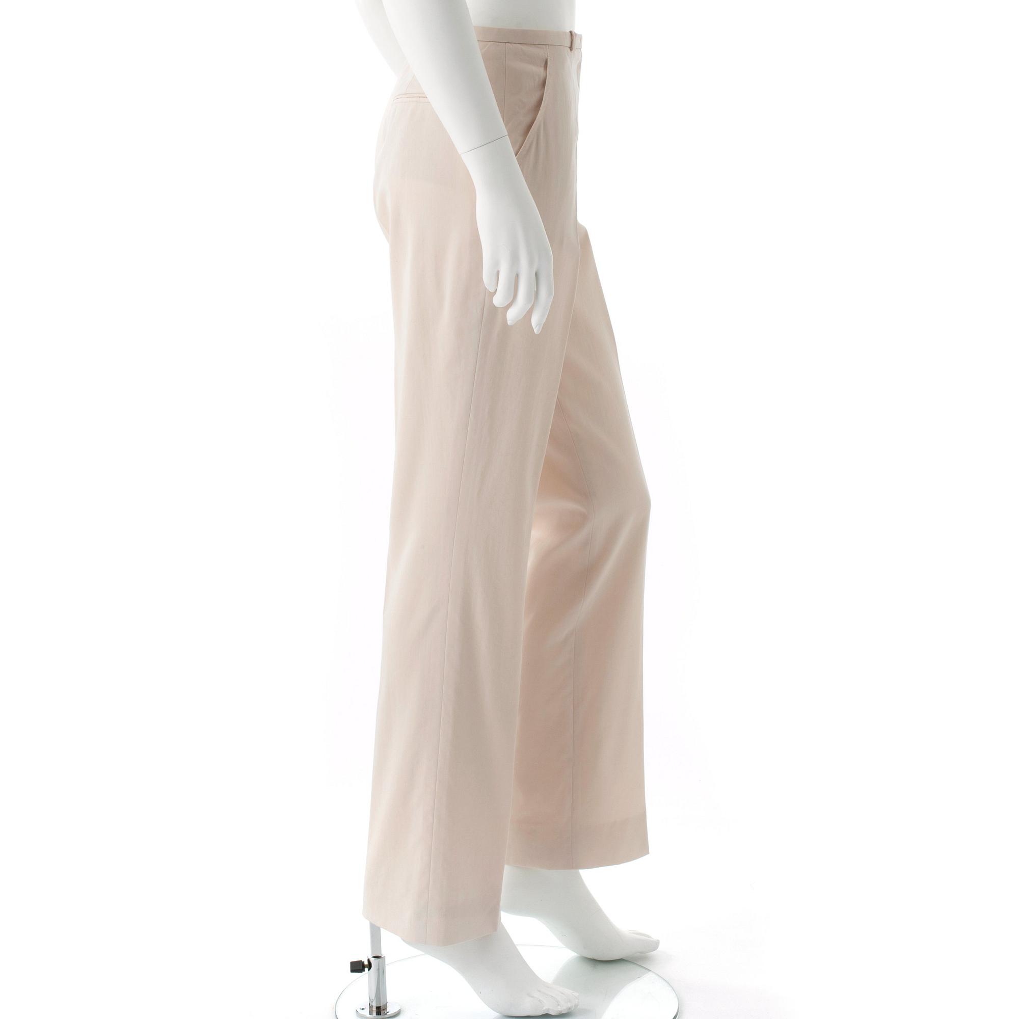 HERMÈS, a pair of creme colored silk pants.