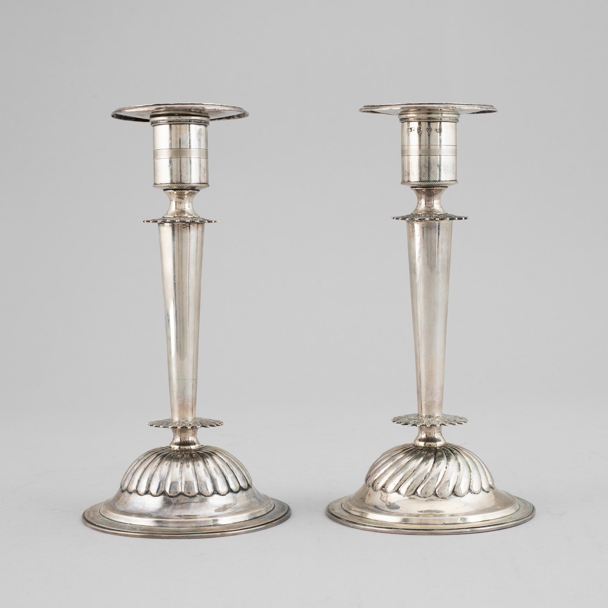 A pair of Empire silver candle sticks, 1823.