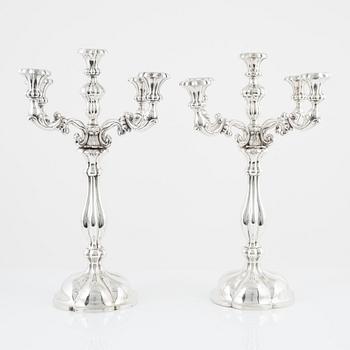 A pair of Austrian silver candelabra, unidentified makers mark, Vienna 1859.