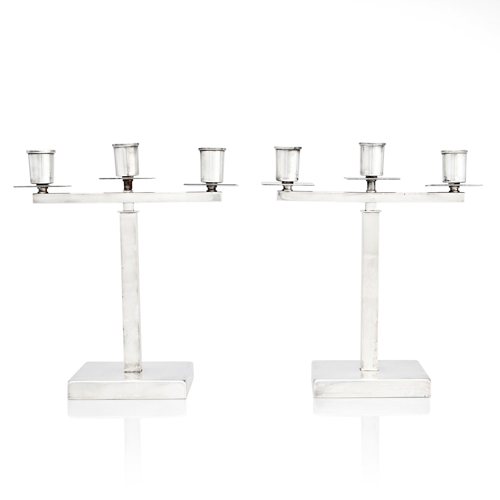 Rolf Engströmer, attributed to, a pair of silver plated candelabra, Fabriksaktiebolaget Kronsilver, Sweden 1930s.