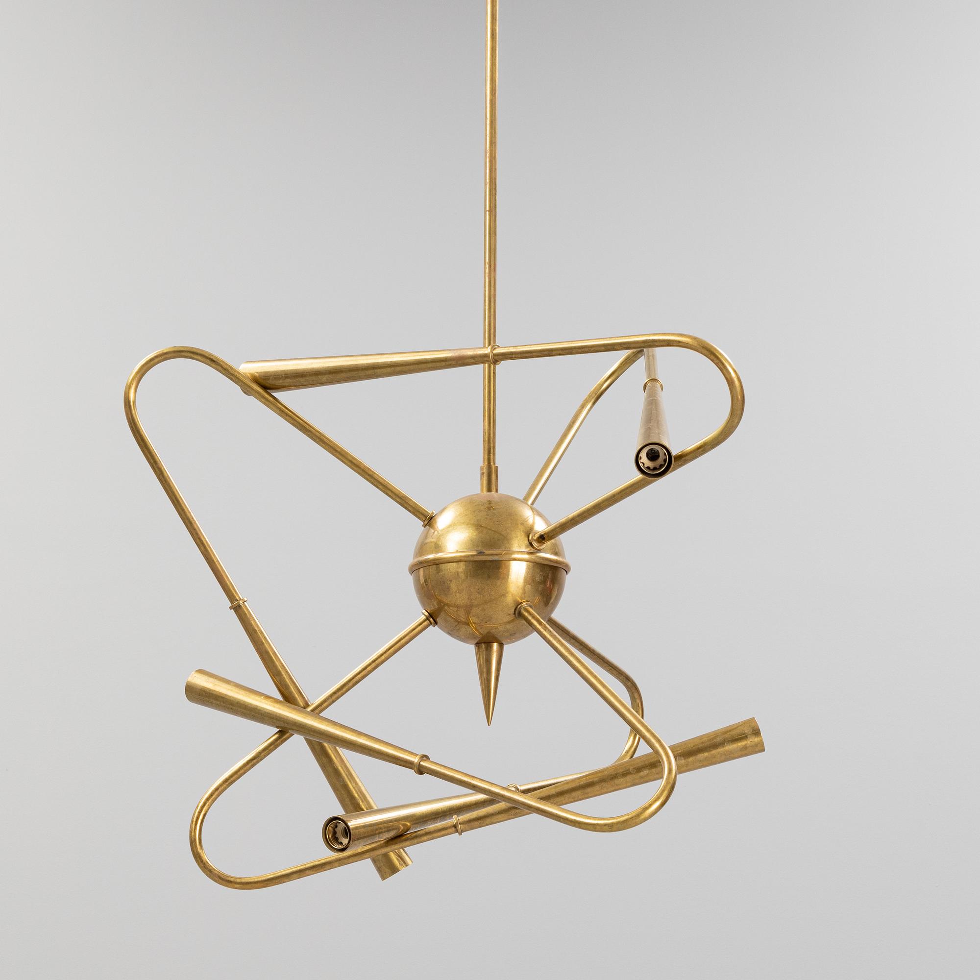 A mid 20th Century brass celiling light.