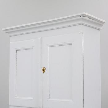 A two-part cabinet, 18th/19th century.