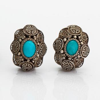 A bracelet and pair of earrings in silver with turquoises. Import marked Risto Aho, Helsinki 1964.