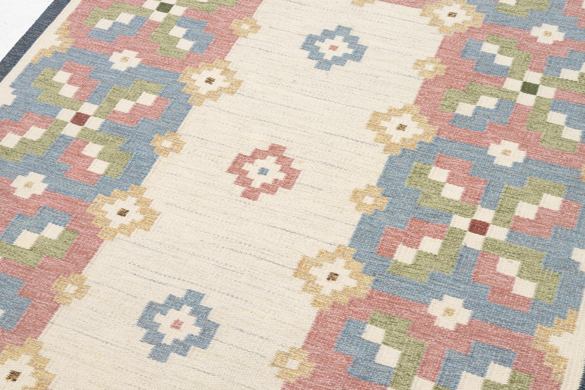 Lizette Norlander, a carpet, 'Lyckeby', flat weave, c 249 x 172 cm, Vävaregården Eringsboda, signed V.