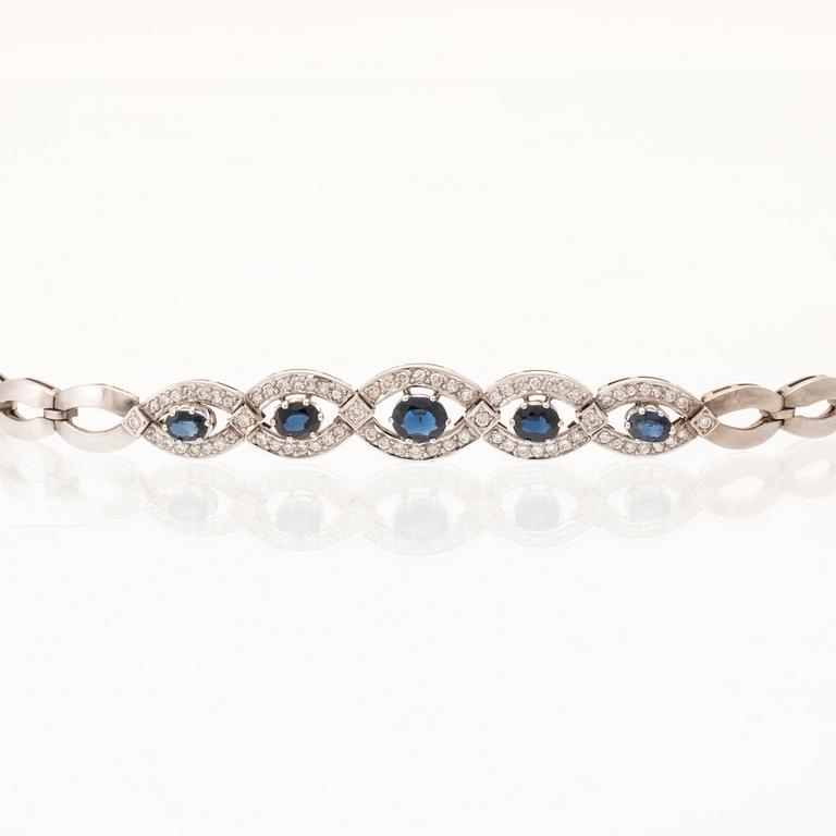 An 18K white gold bracelet set with oval faceted sapphires and brilliant-cut diamonds, Stockholm.