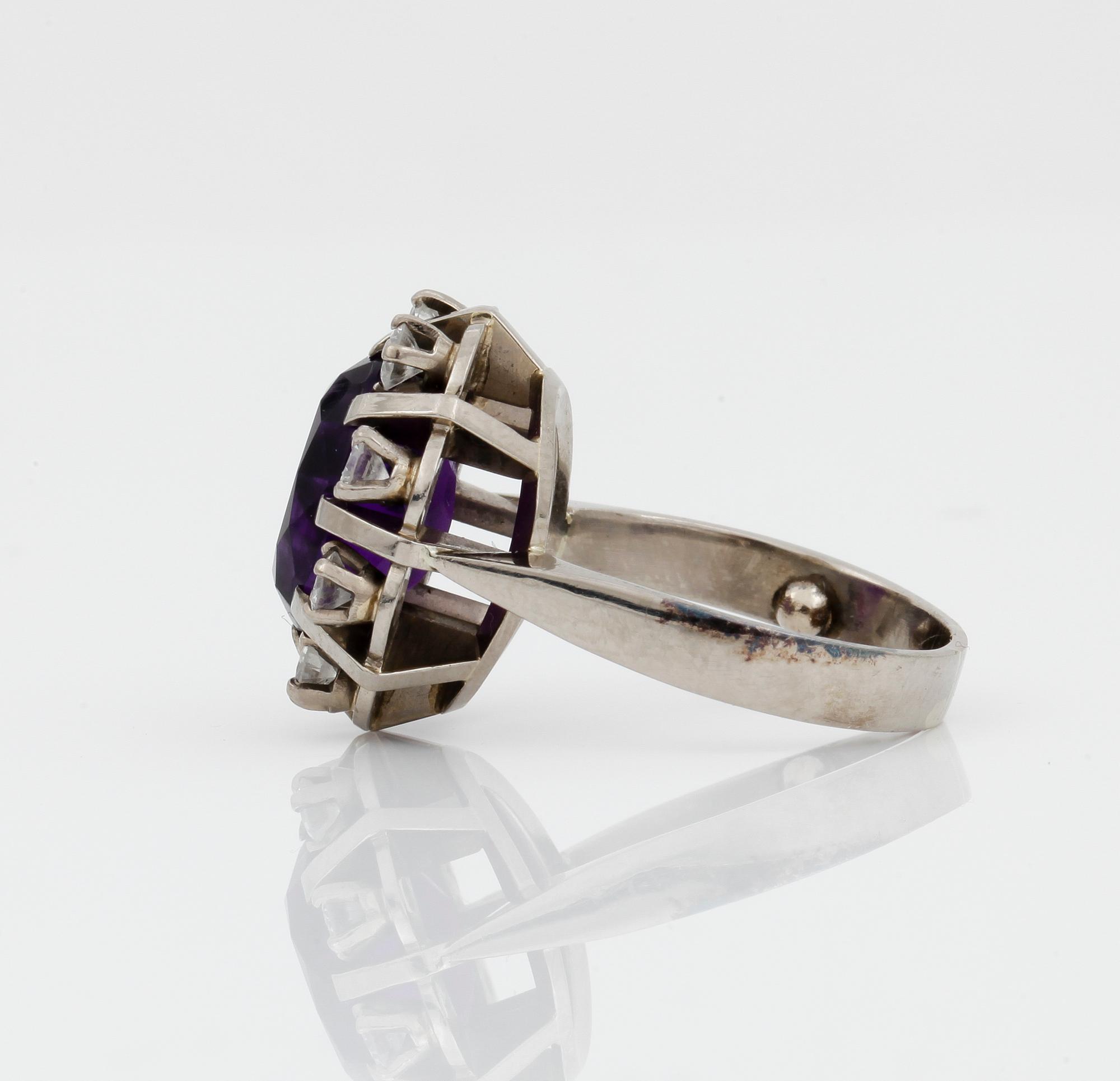 RING, vitguld 18k, ametist, diamanter, 0,72 ct enligt gravyr, Sverige 1964. Vikt ca 11 gram.