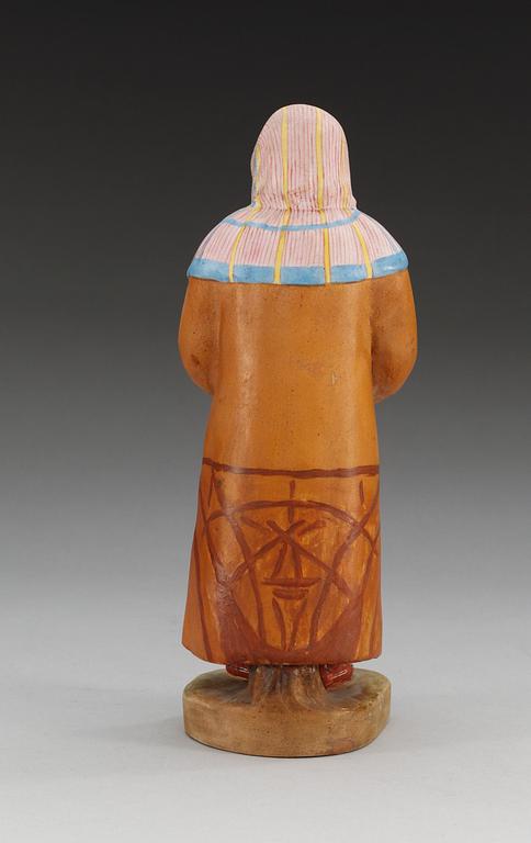 An unmarked Russian bisquit figure depicting a man from Obdorsk (Salekhard), first half of 20th Century.