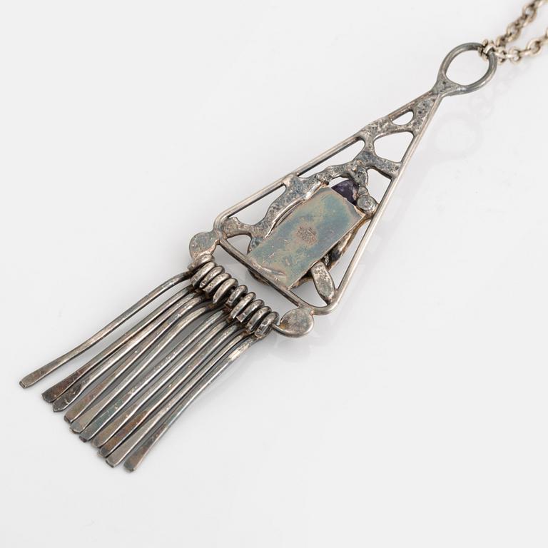 Pendant, pewter, Dansk Smyckekonst and bracelet, sterling silver, Owe Johansson.