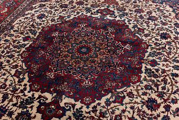 A semi-antique Isfahan carpet, Central Iran, c. 432 x 319 cm.