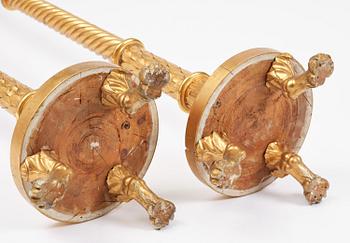 A pair of late Gustavian giltwood torchères by J. Frisk (master in Stockholm 1805-24).