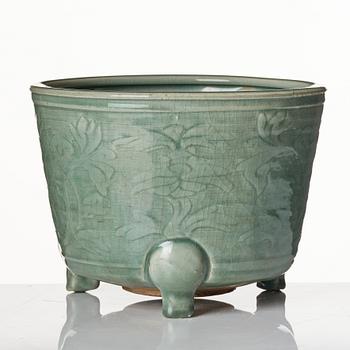 A large celadon tripod censer, Ming dynasty (1368-1644).