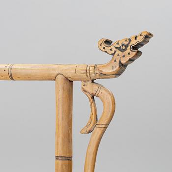 A Chinese bamboo and hardwood clothes rack, 20th century.