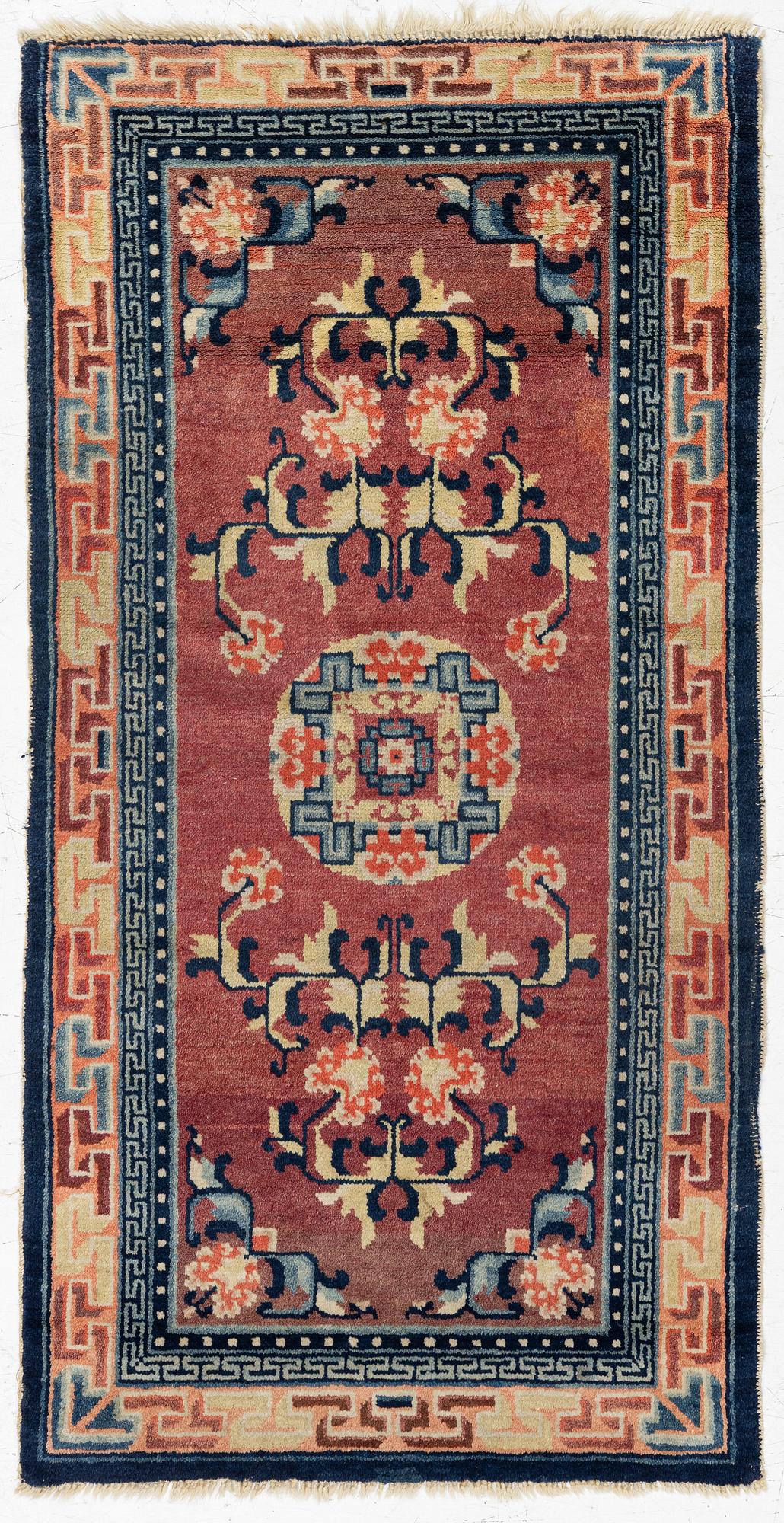 Carpet, antique China, approx. 128 x 67 cm.
