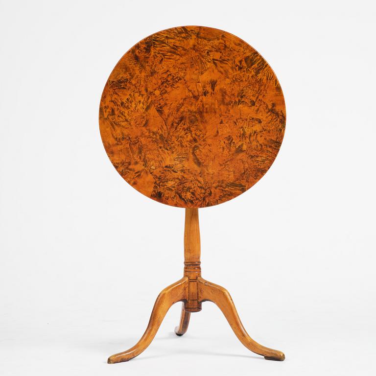 A tilt top table, from around the year 1800.