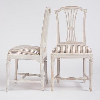 A set of twelve Gustavian chairs by J. Hammarström (master 1794-1812) and E. Ståhl (1794-1820).