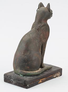 A bronze cat statuette, Egypt, possibly 22-30 Dynasty, 945-332 BC.