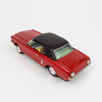 A Bandai tinplate "Ford Mustang with slip action", Japan, 1960s.