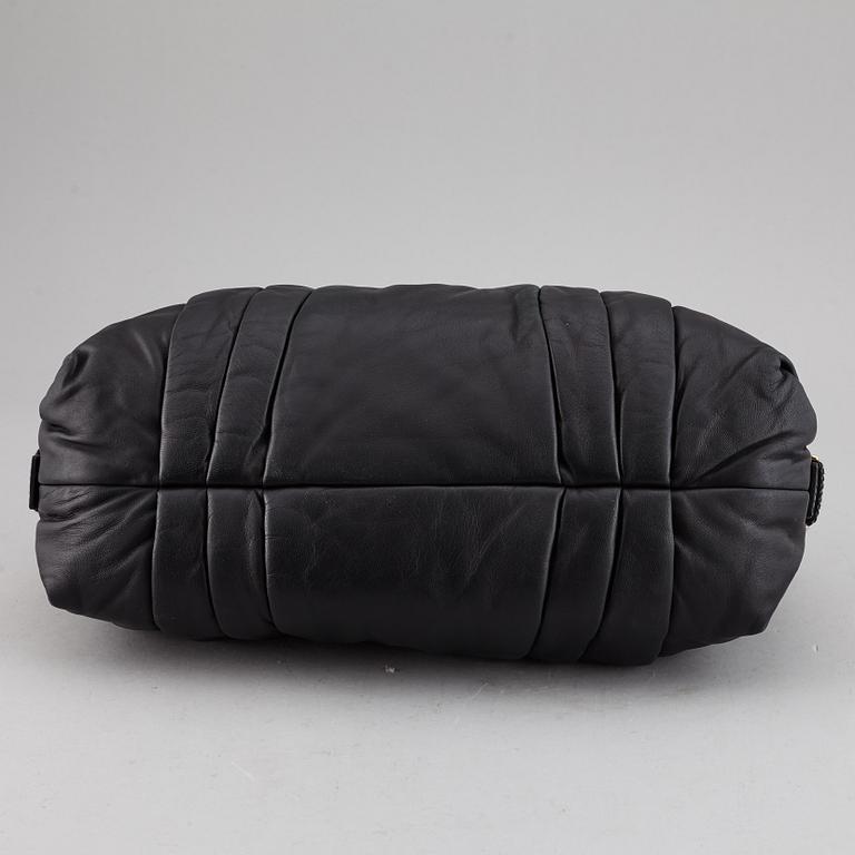 DOLCE & GABBANA, a black leather bag.