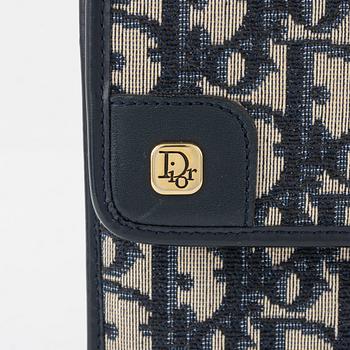 Christian Dior, bag and scarf.