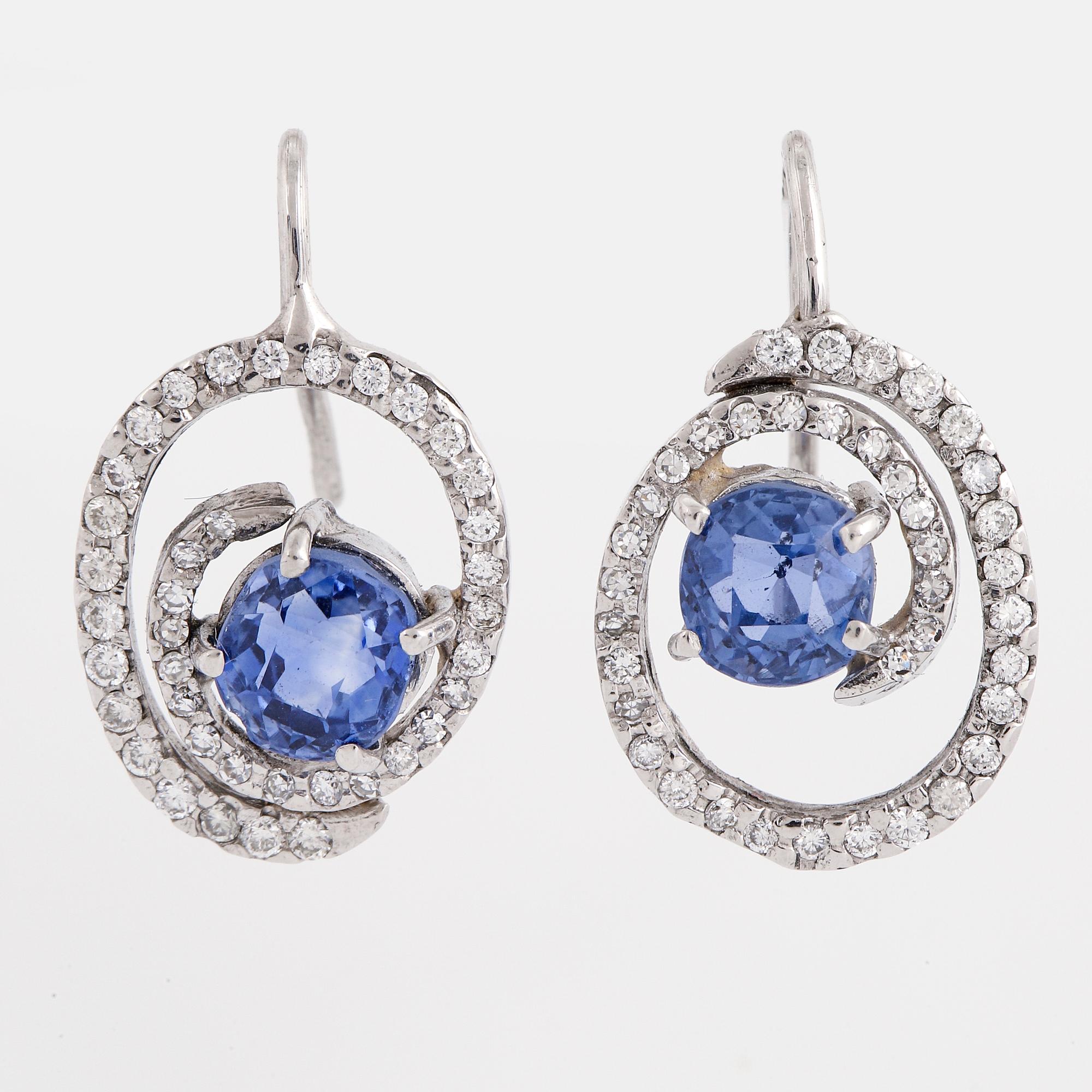 Sapphire and brilliant-cut diamond earrings.