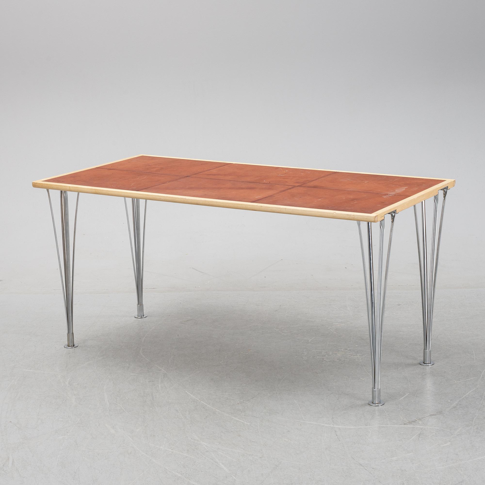 A birch and leather dining table produced by Mathsson International, 21th century.