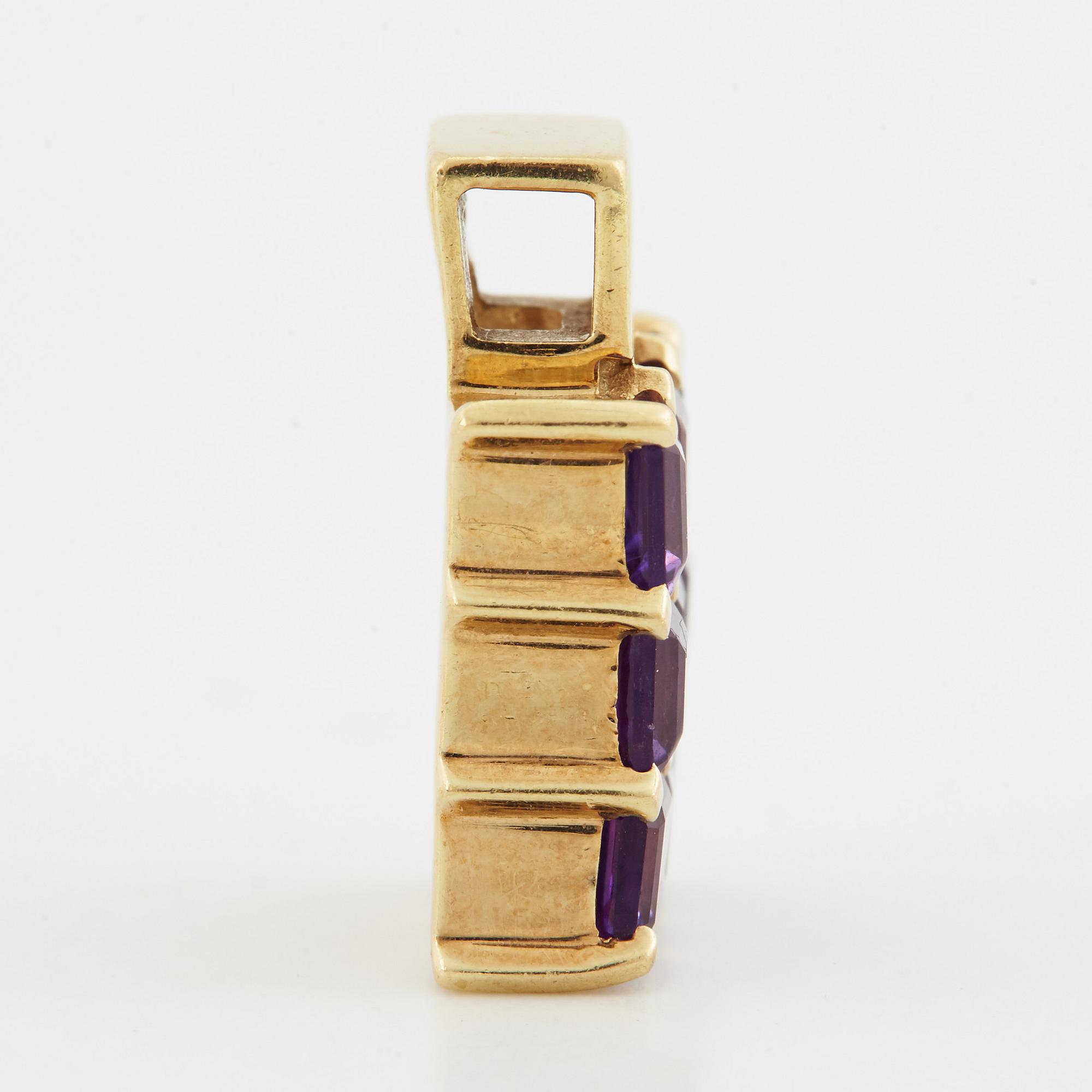Breuning, a pair of earrings, a pendant and a ring.