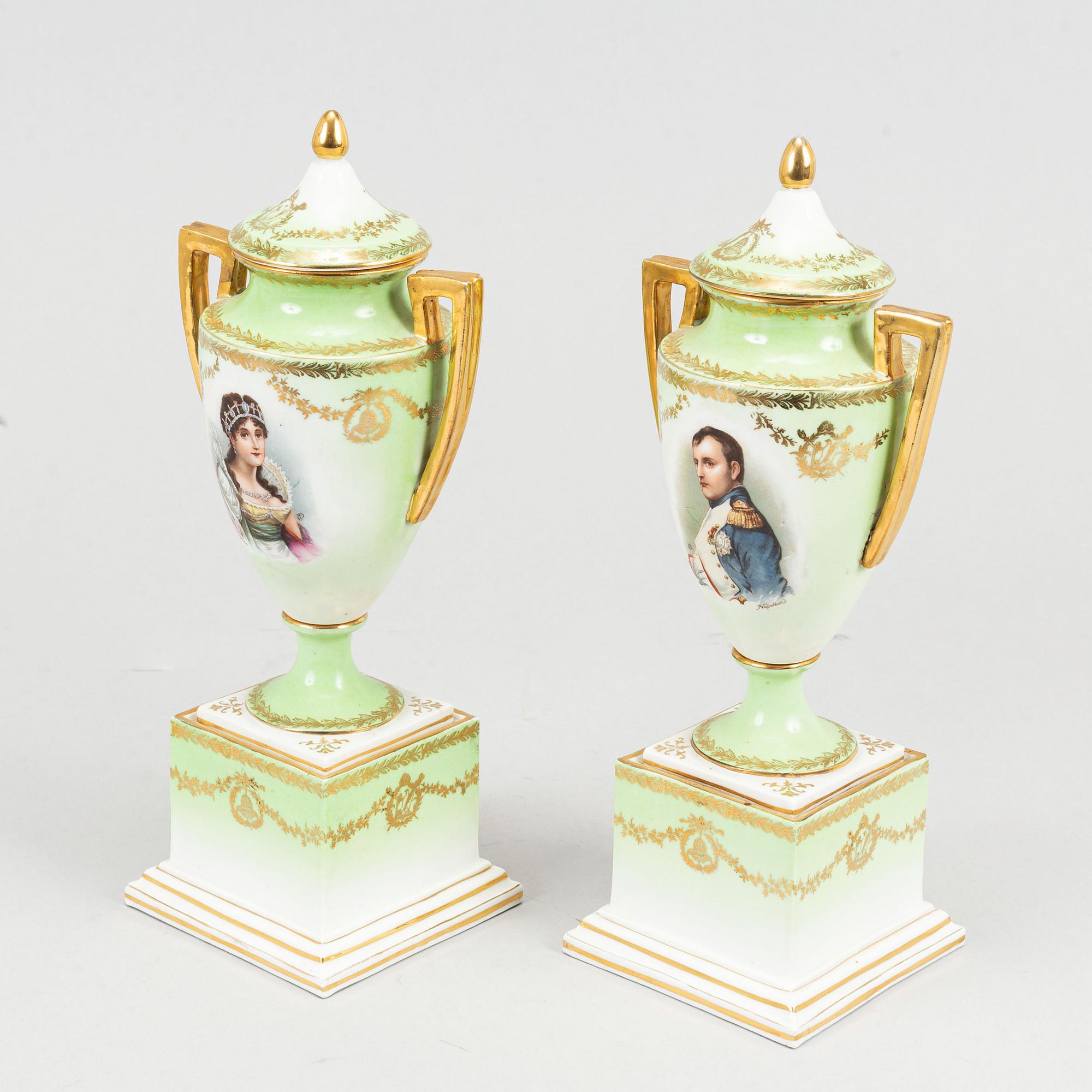 A pair of porcelain urns, possibly naples, first half of the 20th century.