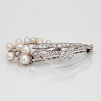 A tiara/brooch set with old cut diamonds and possibly cultured pearls, with noble provenance.