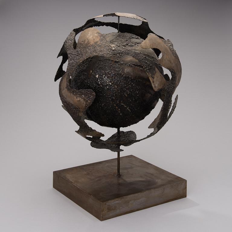 A bronze sculpture signed and dated 1969.