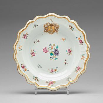 735. A set of seven armorial famille rose soup dishes, Qing dynasty, Qianlong (1736-95).