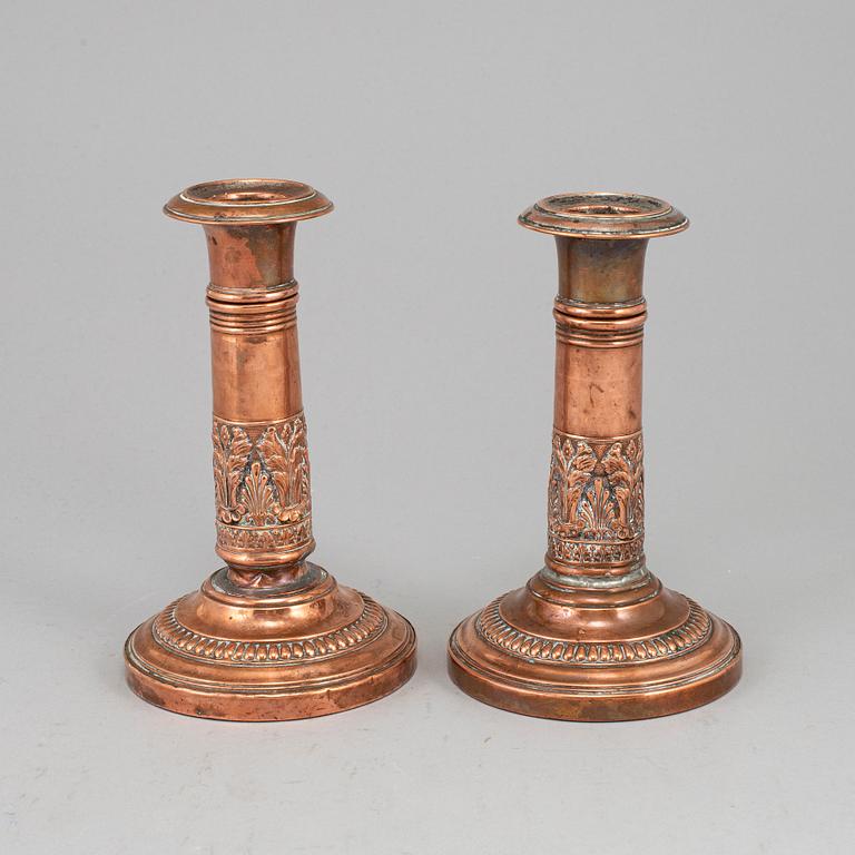 A pair of English early 19th century candlesticks.