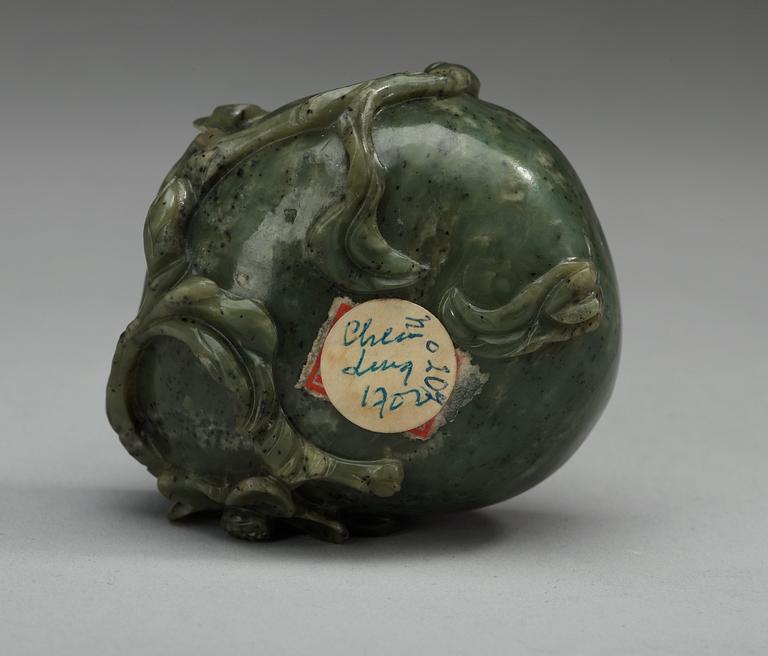 A carved nephrite brush washer, Qing dynasty.