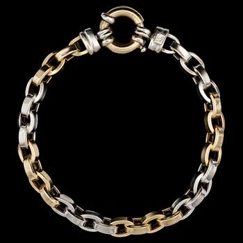 193. A gold and white gold bracelet, weight 18,8 g.
