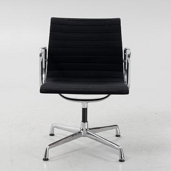 Charles and Ray Eames, an EA 108 aluminum swivel armchair from Vitra.