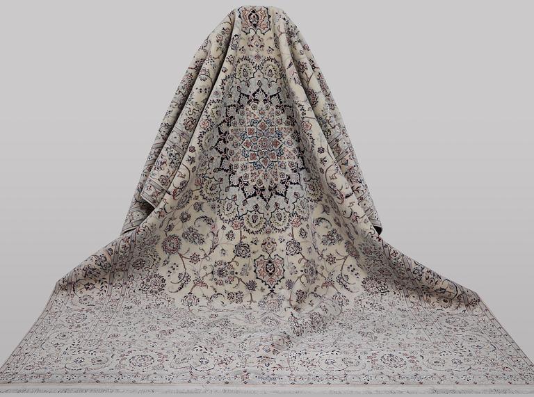 A carpet, Nain, part silk, ca 341 x 245 cm.