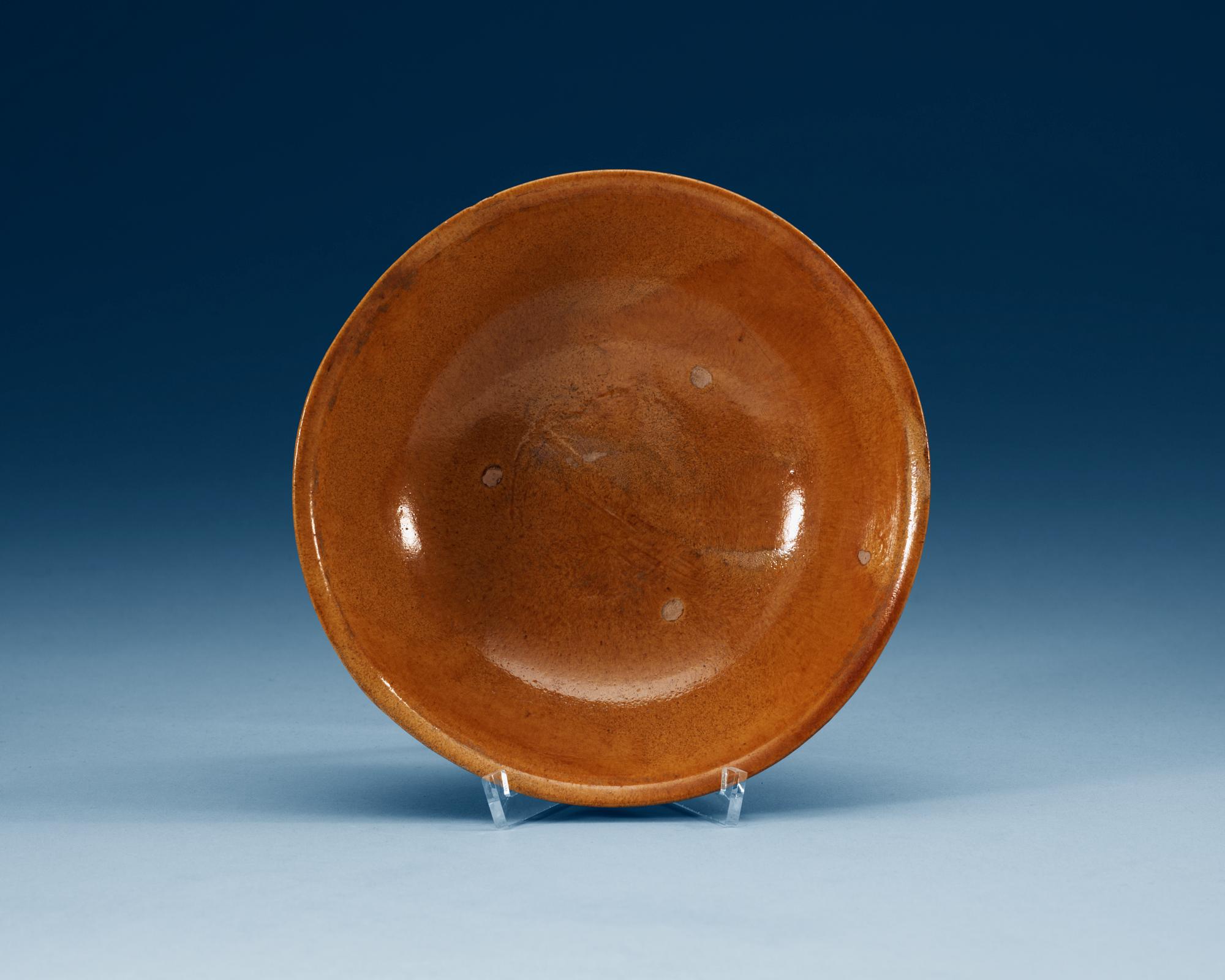 A yellow glazed bowl, Liao dynasty (907-1125).