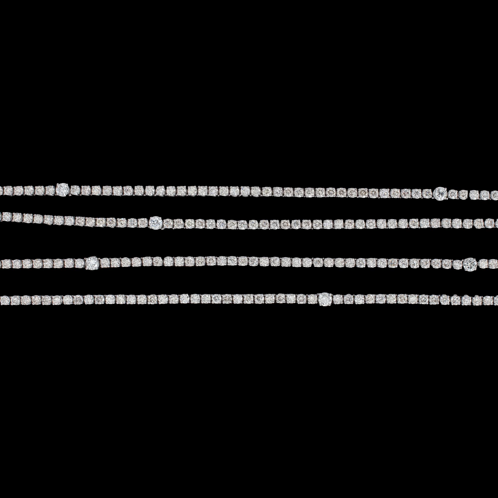COLLIER, lång rivérè med briljantslipade diamanter, tot. 21.75 ct.