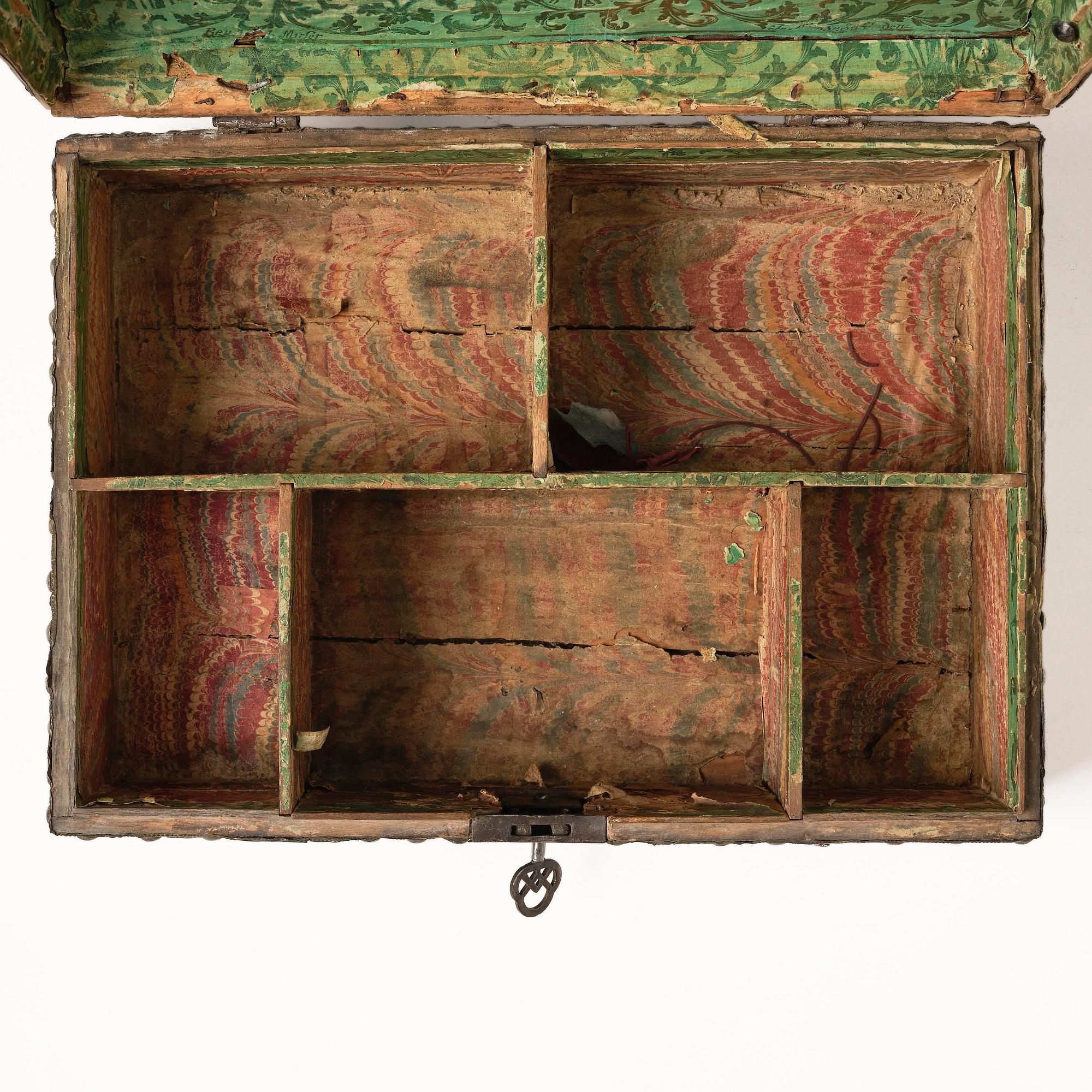 A presumably German baroque repoussé brass writing box, late 17th century.