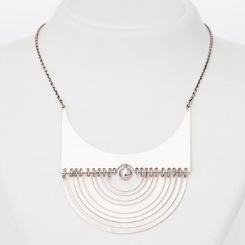TAPIO WIRKKALA, A PENDANT, "Crescent", silver. Westerback 1973.