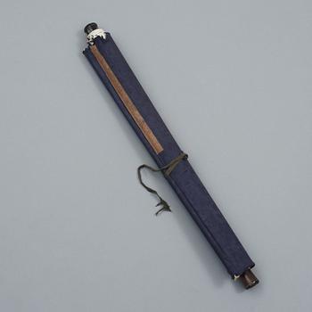 A hanging scroll with flowers and items from the scholars desk, late Qing dynasty (1644-1912).