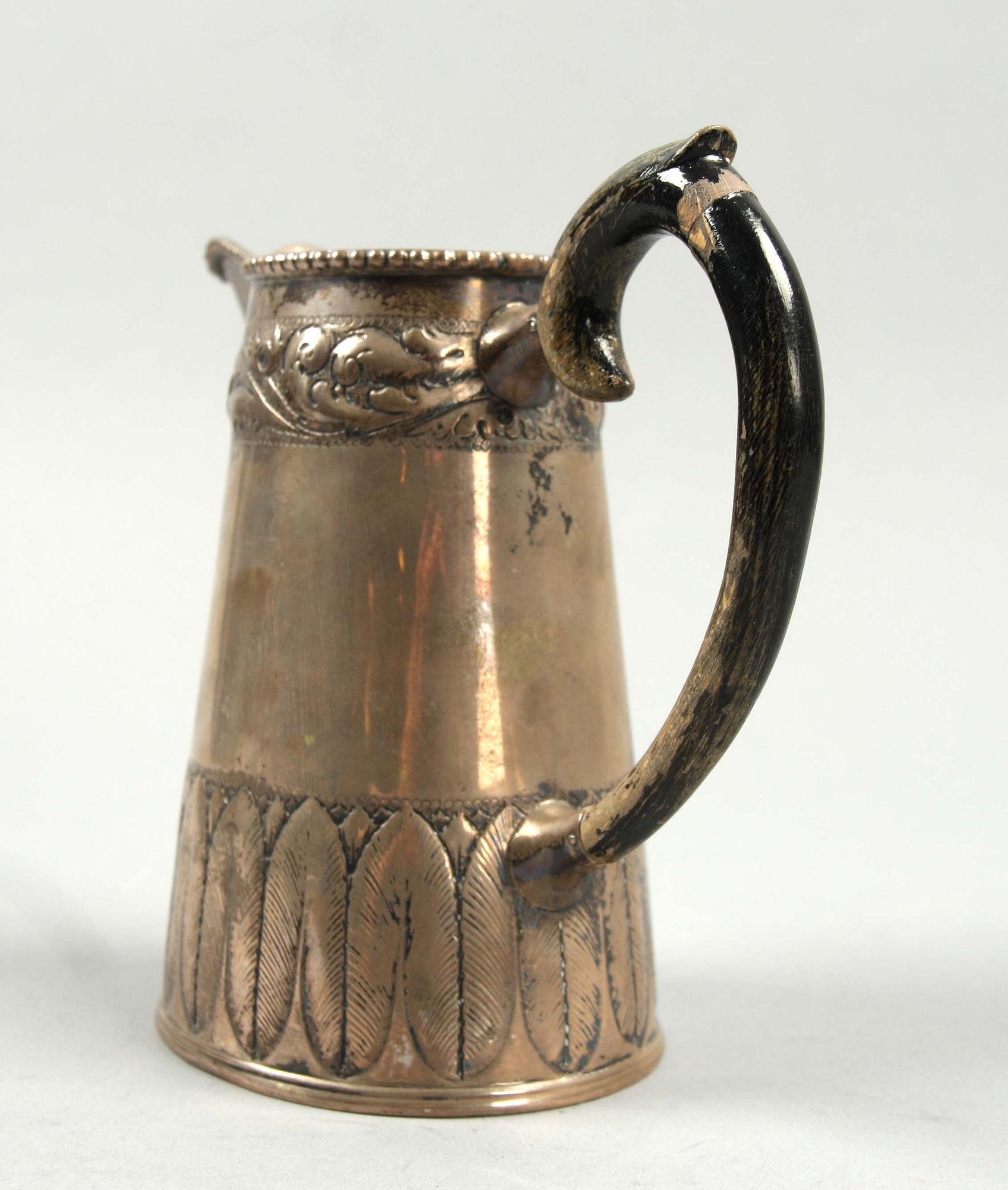 KANNA, silver med handtag i svärtat trä, Köpenhamn, 1921. Vikt ca 300 g.