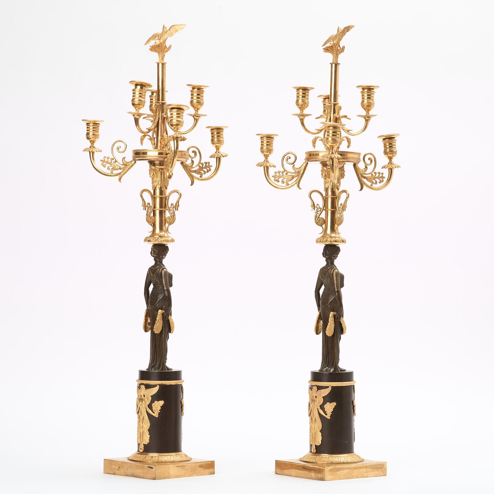 A pair of Empire early 19th century six-light candelabra.